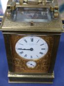 A large Victorian engraved glass cased carriage clock with strike repeat, the dial signed Ollivant &