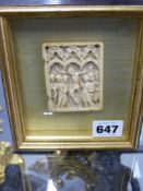 An early carved ivory Continental panel depicting the Crucifixion.