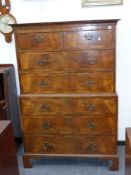 A Georgian and later walnut and crossbanded tallboy chest on chest