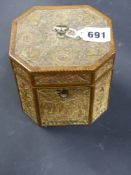 A Georgian inlaid octagonal rolled paper tea caddy each panel with floral motif