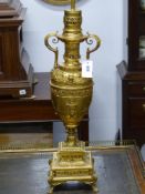 A French gilt bronze twin handle urn mounted as a lamp