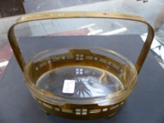 A Jungenstill style pierced brass and glass lined small basket