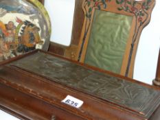 An Arts and Crafts box with decorative copper plaque, two frames, a painted box and a pair of