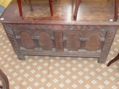 An 18th.c.oak coffer with architectural panel front
