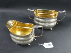 A George III silver cream jug and sugar bowl. London 1812. 12.5ozs