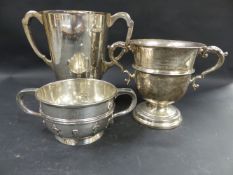A silver two handled trophy. London 1937. 16ozs. Another. London 1921. 8ozs and a two handled