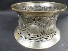 An Irish silver dish ring. Decorated in the Celtic manner with exotic birds and dragons. Dublin