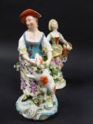 A 19th Century Derby figurine emblematic of summer. 17cm high. Another of a figurine of a woman with