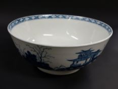 An early Worcester blue and white bowl. With pagoda designs and bridge. 23cm diameter. 10cm high