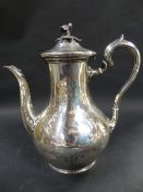 A Victorian silver coffee pot. London 1851. 23ozs all in