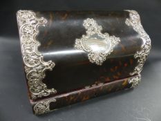 A Victorian silver mounted tortoiseshell stationary box. London 1902. 30cm long. 20cm high