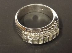 An 18ct white gold baguette cut diamond dress ring