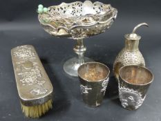 A Chinese silver coloured pedestal dish. With pierced dragon borders. 14cm diameter. 13cm high.