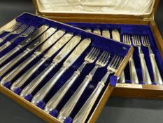 An oak cased set of twelve silver fish knives and forks. London 1926. Goldsmiths and Silversmiths