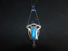 An Art Nouveau silver and enamel openwork pendant. Chester 1909. Maker Charles Horner