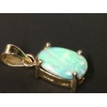 A 14ct gold opal pendant