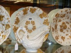 Three Dresden porcelain moulded plates with painted leaf decorations. 28cm diameter. Together with a