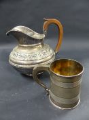 A George III silver cylindrical Christening tankard. With reeded borders. London 1811. Maker