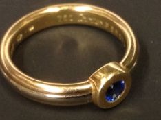 A Modern Cartier sapphire set single stone ring 1995, cased.