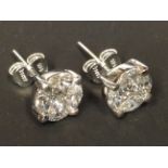 A pair of 14ct white gold diamond cluster earrings. Approximately 2cr