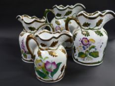 A set of four Ironstone china graduated jug. With moulded oak leaf decorations. 20, 18, 16 and