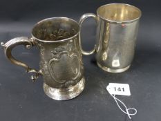 A Victorian silver cylindrical mug. With loop handle. London 1875. 8ozs. Together with a George