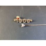 A late 19th Century gentleman's stick pin. With rose cut diamond set foxes head motif. A rose cut