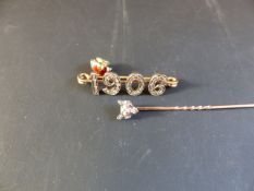 A late 19th Century gentleman's stick pin. With rose cut diamond set foxes head motif. A rose cut