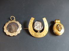 Three 19th Century memorial lockets. One of horseshoe shape with glass case plaited hair memorial (