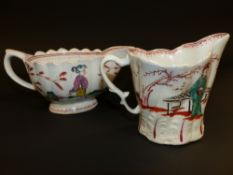 An early bow sauce boat. With chinoiserie decoration. 15cm long. Another cream jug with similar