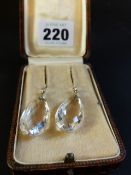 A pair of Rock crystal and diamond set drop earrings