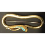 A Victorian gold coloured precious metal brooch. Of serpent form set with tuquoise