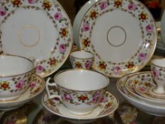 A Derby part tea service. Each piece painted with primroses and gilt designs. (22)