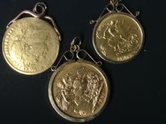 Two mounted sovereigns. 1821 and 1891. Together with a mounted half sovereign. 1914