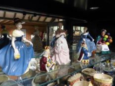 Six Royal Doulton figures and another by Coalport