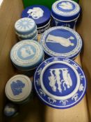 Eight Wedgwood Jasper ware covered small circular boxes