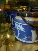 Four Wedgwood blue Jasper ware biscuit barrels, silver plate lids and handles