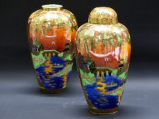 Daisy Makeig-Jones: A pair of Wedgwood Malfrey Pots Willow pattern lustre vases. Z5360. 20cm high. A