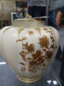 A Royal Worcester Eastern inspired lobed form covered vase with raised gilt moulded decoration
