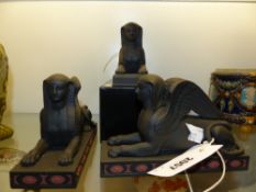 Three Wedgwood black basalt sphinxes, two from a limited edition of 250 entitled the "Couchant