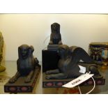 Three Wedgwood black basalt sphinxes, two from a limited edition of 250 entitled the "Couchant