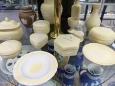 A selection of Wedgwood Jasper ware in pastel yellow with prunus decoration, a couple of other