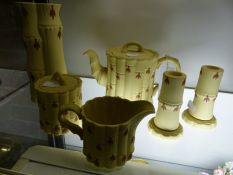 A Wedgwood orientalist buff Jasper ware three piece teaset modelled as bamboo stalks, a similar pair