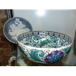 Two Wedgwood studio pottery pieces, a deep bowl with floral and gilt decoration 22cm diameter and