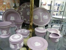 Various Wedgwood lilac Jasper ware to include covered boxes, vases, plates, etc.