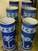 A group of six Wedgwood blue Jasper ware cylinder form spill vases. Height of largest 19cm