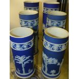 A group of six Wedgwood blue Jasper ware cylinder form spill vases. Height of largest 19cm