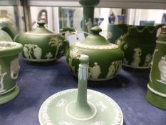 A selection of Wedgwood green Jasper ware to include a teapot and covered sugar bowl, a jug, a