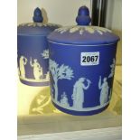 Two Wedgwood blue Jasper ware cylinder form covered jars. 20cm high