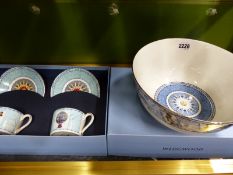 A Wedgwood bone china Millenium pattern deep bowl together with a pair of cased cups and saucers